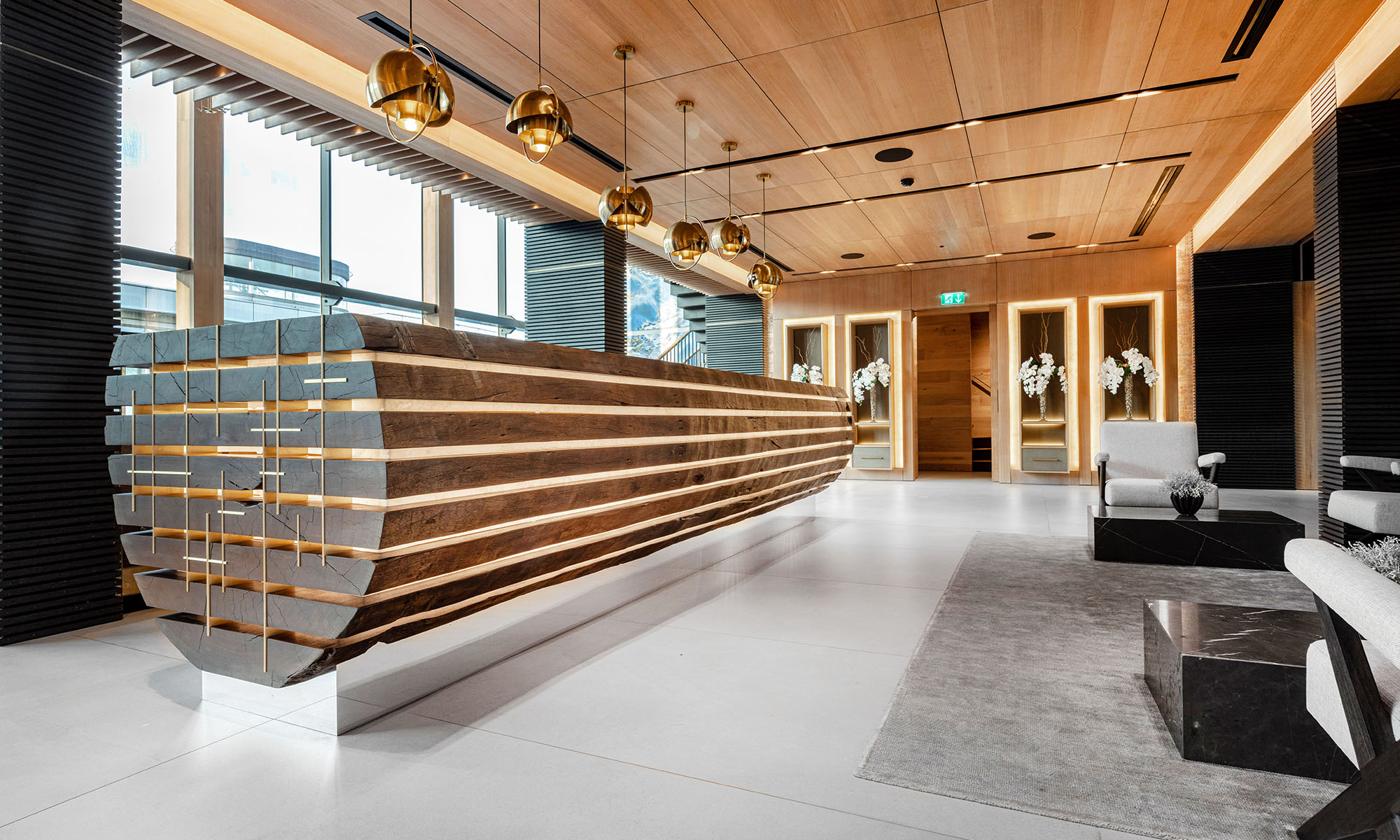 A bespoke bar made from one tree in a commercial setting in the Isle of Man. Bespoke craftsmanship from Willliam Garvey Bespoke furniture maker