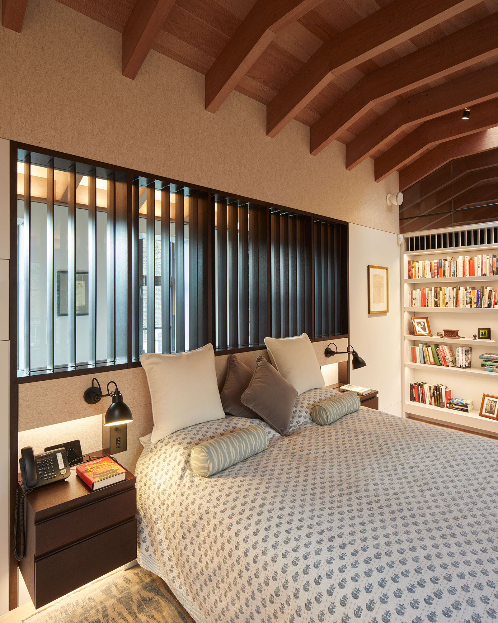 Bespoke headboard in the master suite. Our bespoke cabinetry extended throughout the entirety of this Notting Hill mews property. William Garvey bespoke furniture and cabinet maker