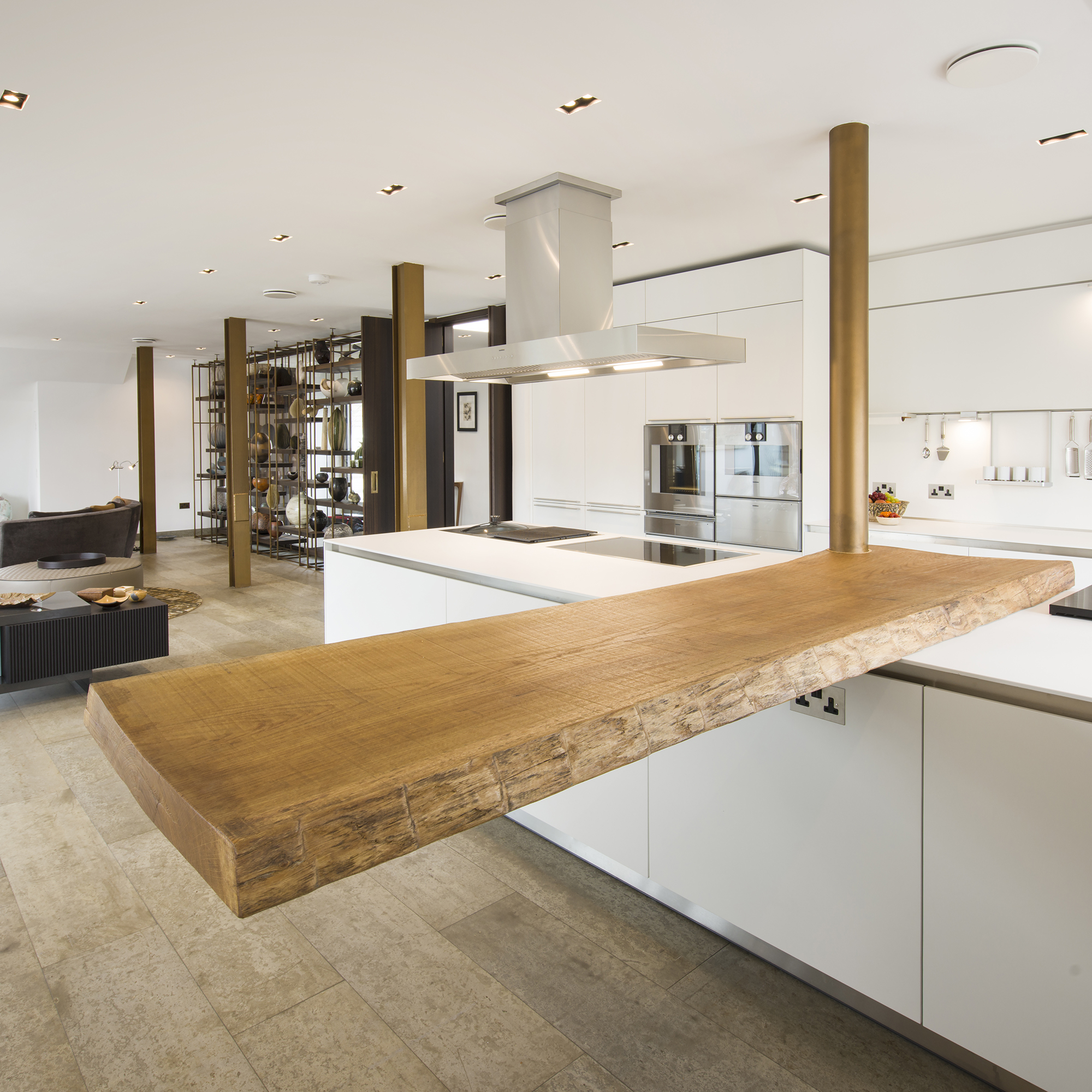 Bespoke waney edge oak kitchen breakfast bar on a bulthaup B3 kitchen in a Grade I listed penthouse in Bath all by William Garvey furniture - british designers and makers