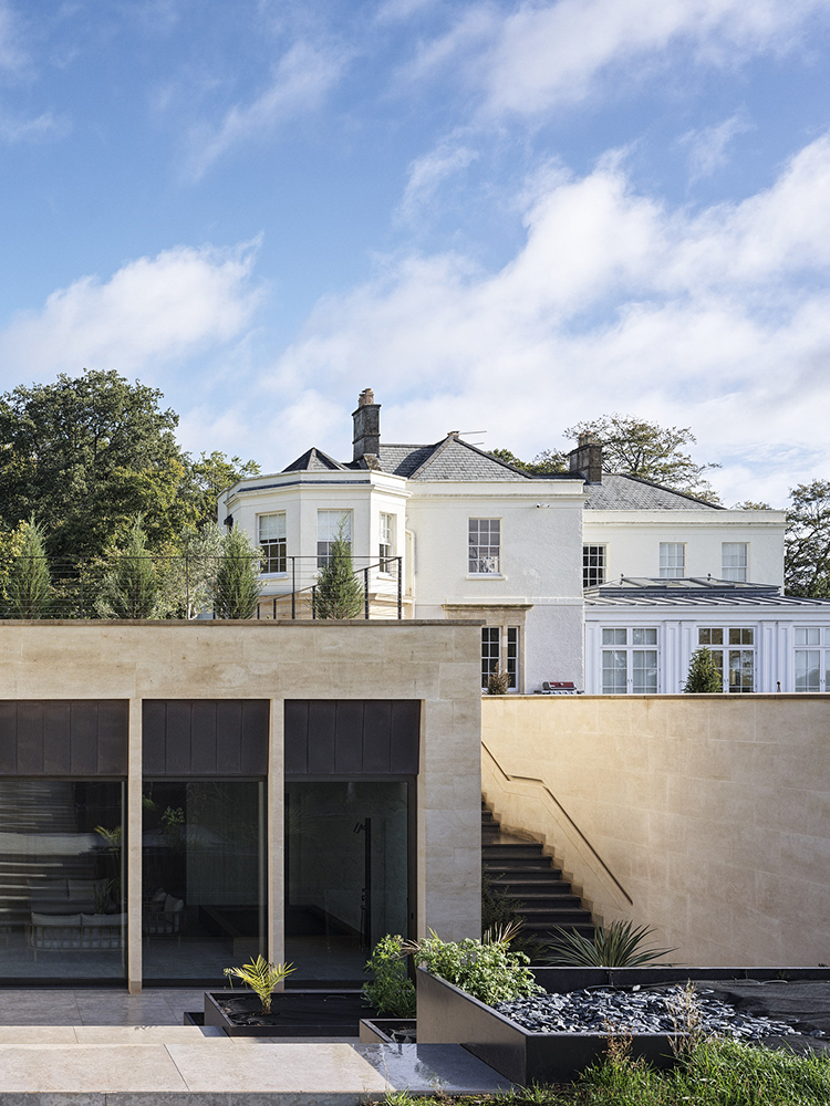 Bespoke waterproof walnut joinery and furniture by William Garvey British furniture designers and makers for the modern extension of a home in Somerset