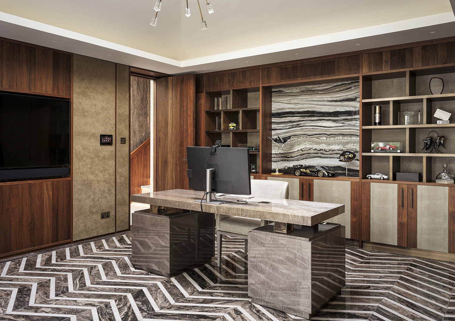 Bespoke walnut wall panelling and fitted shelving with leather panels and brass inlays in the home office suite of a listed manor house in Somerset - all bespoke joinery and furniture by William Garvey British furniture designers and makers