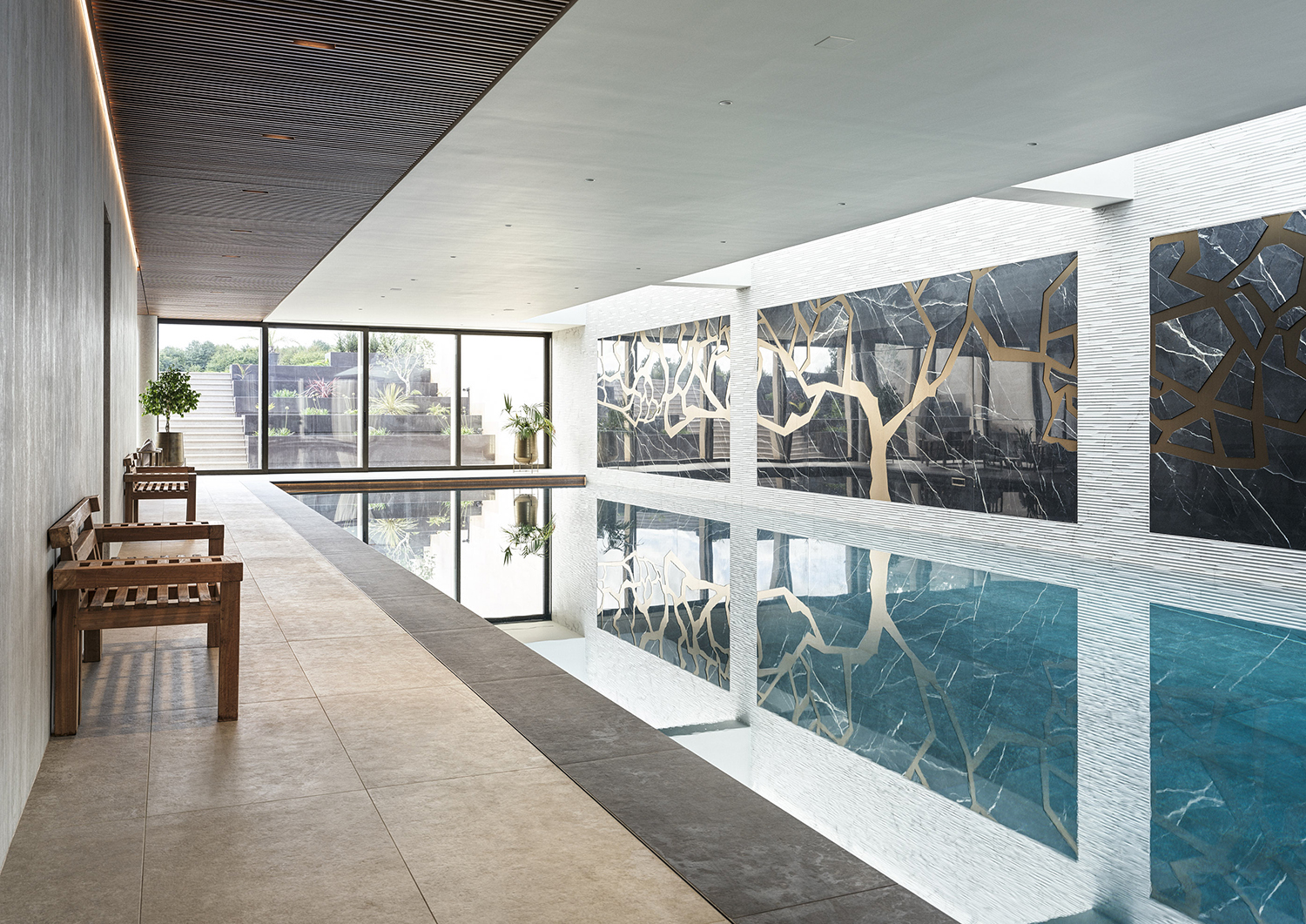 Bespoke waterproof walnut joinery and furniture by William Garvey British furniture designers and makers for the modern extension of a home in Somerset